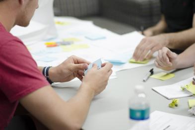 photo of working in a group with sticky notes